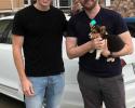 Mark andh Neill with their newly adopted Pembroke Welsh Corgi puppy from Bar H Farms in Missouri.